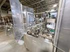 Used Combibloc (Sig) Model 112-32 Aseptic Brick Pack Cartoning Lines. The fillers are capable of running 125 ml, 150 ml, 200 ml or 250 ml cartons (with changeparts). Has Sig Beckhoff HMI with Siemens...