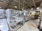 Used Combibloc (Sig) Model 112-32 Aseptic Brick Pack Cartoning Lines. The fillers are capable of running 125 ml, 150 ml, 200 ml or 250 ml cartons (with changeparts). Has Sig Beckhoff HMI with Siemens...