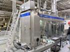Used Combibloc (Sig) Model 112-32 Aseptic Brick Pack Cartoning Lines. The fillers are capable of running 125 ml, 150 ml, 200 ml or 250 ml cartons (with changeparts). Has Sig Beckhoff HMI with Siemens...