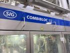 Used Combibloc (Sig) Model 112-32 Aseptic Brick Pack Cartoning Lines. The fillers are capable of running 125 ml, 150 ml, 200 ml or 250 ml cartons (with changeparts). Has Sig Beckhoff HMI with Siemens...