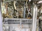 Used Combibloc (Sig) Model 112-32 Aseptic Brick Pack Cartoning Lines. The fillers are capable of running 125 ml, 150 ml, 200 ml or 250 ml cartons (with changeparts). Has Sig Beckhoff HMI with Siemens...