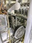 Used Combibloc (Sig) Model 112-32 Aseptic Brick Pack Cartoning Lines. The fillers are capable of running 125 ml, 150 ml, 200 ml or 250 ml cartons (with changeparts). Has Sig Beckhoff HMI with Siemens...