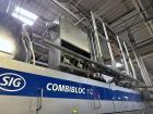 Used Combibloc (Sig) Model 112-32 Aseptic Brick Pack Cartoning Lines. The fillers are capable of running 125 ml, 150 ml, 200 ml or 250 ml cartons (with changeparts). Has Sig Beckhoff HMI with Siemens...