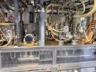 Used Combibloc (Sig) Model 112-32 Aseptic Brick Pack Cartoning Lines. The fillers are capable of running 125 ml, 150 ml, 200 ml or 250 ml cartons (with changeparts). Has Sig Beckhoff HMI with Siemens...