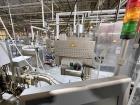 Used Combibloc (Sig) Model 112-32 Aseptic Brick Pack Cartoning Lines. The fillers are capable of running 125 ml, 150 ml, 200 ml or 250 ml cartons (with changeparts). Has Sig Beckhoff HMI with Siemens...