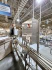 Used Combibloc (Sig) Model 112-32 Aseptic Brick Pack Cartoning Lines. The fillers are capable of running 125 ml, 150 ml, 200 ml or 250 ml cartons (with changeparts). Has Sig Beckhoff HMI with Siemens...