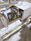 Used Combibloc (Sig) Model 112-32 Aseptic Brick Pack Cartoning Lines. The fillers are capable of running 125 ml, 150 ml, 200 ml or 250 ml cartons (with changeparts). Has Sig Beckhoff HMI with Siemens...