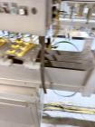 Used Combibloc (Sig) Model 112-32 Aseptic Brick Pack Cartoning Lines. The fillers are capable of running 125 ml, 150 ml, 200 ml or 250 ml cartons (with changeparts). Has Sig Beckhoff HMI with Siemens...