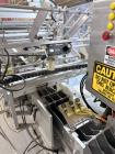 Used Combibloc (Sig) Model 112-32 Aseptic Brick Pack Cartoning Lines. The fillers are capable of running 125 ml, 150 ml, 200 ml or 250 ml cartons (with changeparts). Has Sig Beckhoff HMI with Siemens...