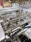 Used Combibloc (Sig) Model 112-32 Aseptic Brick Pack Cartoning Lines. The fillers are capable of running 125 ml, 150 ml, 200 ml or 250 ml cartons (with changeparts). Has Sig Beckhoff HMI with Siemens...