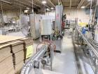 Used Combibloc (Sig) Model 112-32 Aseptic Brick Pack Cartoning Lines. The fillers are capable of running 125 ml, 150 ml, 200 ml or 250 ml cartons (with changeparts). Has Sig Beckhoff HMI with Siemens...