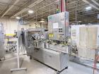Used Combibloc (Sig) Model 112-32 Aseptic Brick Pack Cartoning Lines. The fillers are capable of running 125 ml, 150 ml, 200 ml or 250 ml cartons (with changeparts). Has Sig Beckhoff HMI with Siemens...