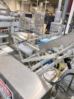 Used Combibloc (Sig) Model 112-32 Aseptic Brick Pack Cartoning Lines. The fillers are capable of running 125 ml, 150 ml, 200 ml or 250 ml cartons (with changeparts). Has Sig Beckhoff HMI with Siemens...