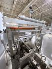 Used Combibloc (Sig) Model 112-32 Aseptic Brick Pack Cartoning Lines. The fillers are capable of running 125 ml, 150 ml, 200 ml or 250 ml cartons (with changeparts). Has Sig Beckhoff HMI with Siemens...
