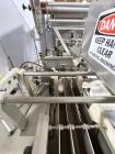 Used Combibloc (Sig) Model 112-32 Aseptic Brick Pack Cartoning Lines. The fillers are capable of running 125 ml, 150 ml, 200 ml or 250 ml cartons (with changeparts). Has Sig Beckhoff HMI with Siemens...