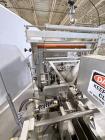 Used Combibloc (Sig) Model 112-32 Aseptic Brick Pack Cartoning Lines. The fillers are capable of running 125 ml, 150 ml, 200 ml or 250 ml cartons (with changeparts). Has Sig Beckhoff HMI with Siemens...