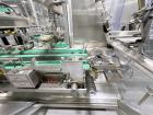 Used Combibloc (Sig) Model 112-32 Aseptic Brick Pack Cartoning Lines. The fillers are capable of running 125 ml, 150 ml, 200 ml or 250 ml cartons (with changeparts). Has Sig Beckhoff HMI with Siemens...