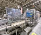 Used Combibloc (Sig) Model 112-32 Aseptic Brick Pack Cartoning Lines. The fillers are capable of running 125 ml, 150 ml, 200 ml or 250 ml cartons (with changeparts). Has Sig Beckhoff HMI with Siemens...
