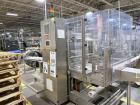 Used Combibloc (Sig) Model 112-32 Aseptic Brick Pack Cartoning Lines. The fillers are capable of running 125 ml, 150 ml, 200 ml or 250 ml cartons (with changeparts). Has Sig Beckhoff HMI with Siemens...