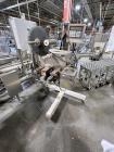 Used Combibloc (Sig) Model 112-32 Aseptic Brick Pack Cartoning Lines. The fillers are capable of running 125 ml, 150 ml, 200 ml or 250 ml cartons (with changeparts). Has Sig Beckhoff HMI with Siemens...