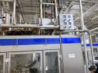 Used Combibloc (Sig) Model 112-32 Aseptic Brick Pack Cartoning Lines. The fillers are capable of running 125 ml, 150 ml, 200 ml or 250 ml cartons (with changeparts). Has Sig Beckhoff HMI with Siemens...