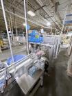Used Combibloc (Sig) Model 112-32 Aseptic Brick Pack Cartoning Lines. The fillers are capable of running 125 ml, 150 ml, 200 ml or 250 ml cartons (with changeparts). Has Sig Beckhoff HMI with Siemens...