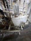 Used Combibloc (Sig) Model 112-32 Aseptic Brick Pack Cartoning Lines. The fillers are capable of running 125 ml, 150 ml, 200 ml or 250 ml cartons (with changeparts). Has Sig Beckhoff HMI with Siemens...