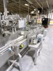 Used Combibloc (Sig) Model 112-32 Aseptic Brick Pack Cartoning Lines. The fillers are capable of running 125 ml, 150 ml, 200 ml or 250 ml cartons (with changeparts). Has Sig Beckhoff HMI with Siemens...