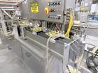 Used Combibloc (Sig) Model 112-32 Aseptic Brick Pack Cartoning Lines. The fillers are capable of running 125 ml, 150 ml, 200 ml or 250 ml cartons (with changeparts). Has Sig Beckhoff HMI with Siemens...