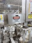 Used Combibloc (Sig) Model 112-32 Aseptic Brick Pack Cartoning Lines. The fillers are capable of running 125 ml, 150 ml, 200 ml or 250 ml cartons (with changeparts). Has Sig Beckhoff HMI with Siemens...