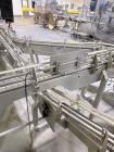 Used Combibloc (Sig) Model 112-32 Aseptic Brick Pack Cartoning Lines. The fillers are capable of running 125 ml, 150 ml, 200 ml or 250 ml cartons (with changeparts). Has Sig Beckhoff HMI with Siemens...