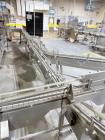 Used Combibloc (Sig) Model 112-32 Aseptic Brick Pack Cartoning Lines. The fillers are capable of running 125 ml, 150 ml, 200 ml or 250 ml cartons (with changeparts). Has Sig Beckhoff HMI with Siemens...