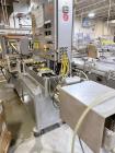 Used Combibloc (Sig) Model 112-32 Aseptic Brick Pack Cartoning Lines. The fillers are capable of running 125 ml, 150 ml, 200 ml or 250 ml cartons (with changeparts). Has Sig Beckhoff HMI with Siemens...