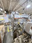 Used Combibloc (Sig) Model 112-32 Aseptic Brick Pack Cartoning Lines. The fillers are capable of running 125 ml, 150 ml, 200 ml or 250 ml cartons (with changeparts). Has Sig Beckhoff HMI with Siemens...