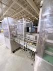 Used Combibloc (Sig) Model 112-32 Aseptic Brick Pack Cartoning Lines. The fillers are capable of running 125 ml, 150 ml, 200 ml or 250 ml cartons (with changeparts). Has Sig Beckhoff HMI with Siemens...