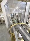 Used Combibloc (Sig) Model 112-32 Aseptic Brick Pack Cartoning Lines. The fillers are capable of running 125 ml, 150 ml, 200 ml or 250 ml cartons (with changeparts). Has Sig Beckhoff HMI with Siemens...