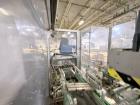 Used Combibloc (Sig) Model 112-32 Aseptic Brick Pack Cartoning Lines. The fillers are capable of running 125 ml, 150 ml, 200 ml or 250 ml cartons (with changeparts). Has Sig Beckhoff HMI with Siemens...