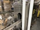 Used Combibloc (Sig) Model 112-32 Aseptic Brick Pack Cartoning Lines. The fillers are capable of running 125 ml, 150 ml, 200 ml or 250 ml cartons (with changeparts). Has Sig Beckhoff HMI with Siemens...