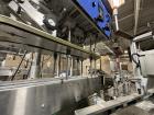 Used Combibloc (Sig) Model 112-32 Aseptic Brick Pack Cartoning Lines. The fillers are capable of running 125 ml, 150 ml, 200 ml or 250 ml cartons (with changeparts). Has Sig Beckhoff HMI with Siemens...
