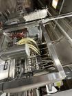 Used Combibloc (Sig) Model 112-32 Aseptic Brick Pack Cartoning Lines. The fillers are capable of running 125 ml, 150 ml, 200 ml or 250 ml cartons (with changeparts). Has Sig Beckhoff HMI with Siemens...