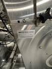 Used Combibloc (Sig) Model 112-32 Aseptic Brick Pack Cartoning Lines. The fillers are capable of running 125 ml, 150 ml, 200 ml or 250 ml cartons (with changeparts). Has Sig Beckhoff HMI with Siemens...