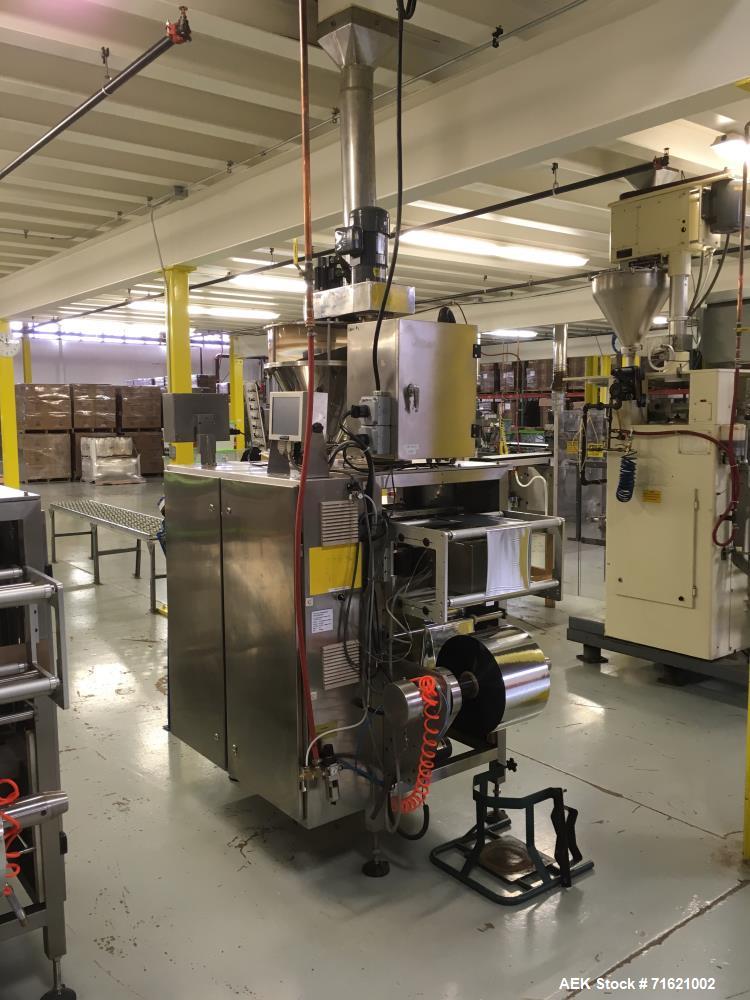 Used American Packaging and Plant Equipment Vertobagger Tomcat Machine. 50 Liter Hopper, 20g-1500g fill weight, Servo motor, 4.8 Nm. PLC with full color touch-screen controller. Agitation drive 0.2 k...