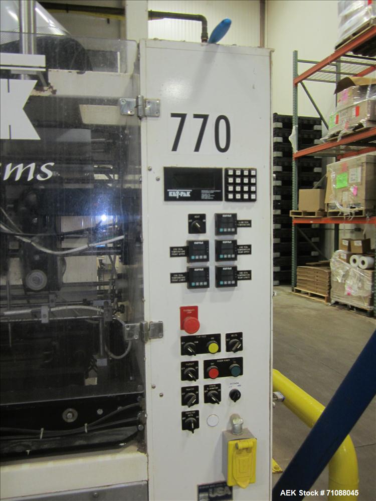 Used Key-Pak Model V400S vertical form fill seal machine. Bag size range: (Width) 6" - 15" (Length) 6" - 30". Has Markem hot stamp coder, side belt pull down, static eliminator,  registration and Mat...