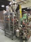 Used American Packaging & Plant Equipment VertoBagger Falcon BrickPack Machine. Vacuum brick bag, 8-15 bags/min, bag length 2-11