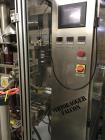 Used American Packaging & Plant Equipment VertoBagger Falcon BrickPack Machine. Vacuum brick bag, 8-15 bags/min, bag length 2-11