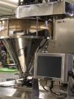 Used American Packaging and Plant Equipment Vertobagger Tomcat Machine. 50 Liter Hopper, 20g-1500g fill weight, Servo motor, 4.8 Nm. PLC with full color touch-screen controller. Agitation drive 0.2 k...