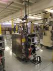 Used American Packaging and Plant Equipment Vertobagger Tomcat Machine. 50 Liter Hopper, 20g-1500g fill weight, Servo motor, 4.8 Nm. PLC with full color touch-screen controller. Agitation drive 0.2 k...