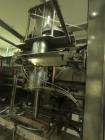 Used Viking Masek Model ES400 Vertical Form Fill Seal with Image Auger Filler. Capable of speeds up to 60 bags per minute. Bag size range: 100mm - 400mm (width) x 100mm - 600mm (length). Heat seal ja...