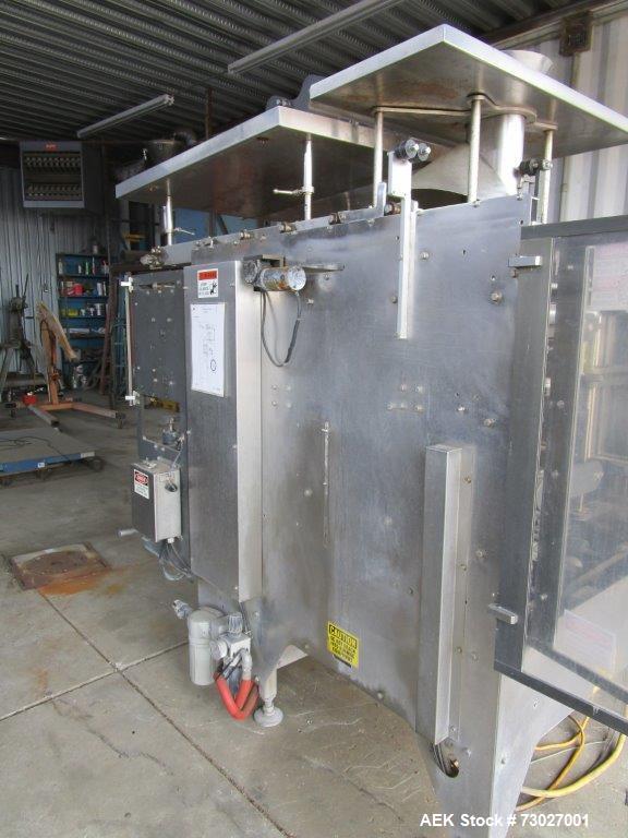 Used Pacmac Model 9500 Vertical Form, Fill, and Seal Machine with Zipper. Has a bag size range of: 3" to 15" (wide) and 4" to 19" (length). Has a maximum web width of 36". Equipped with film registra...
