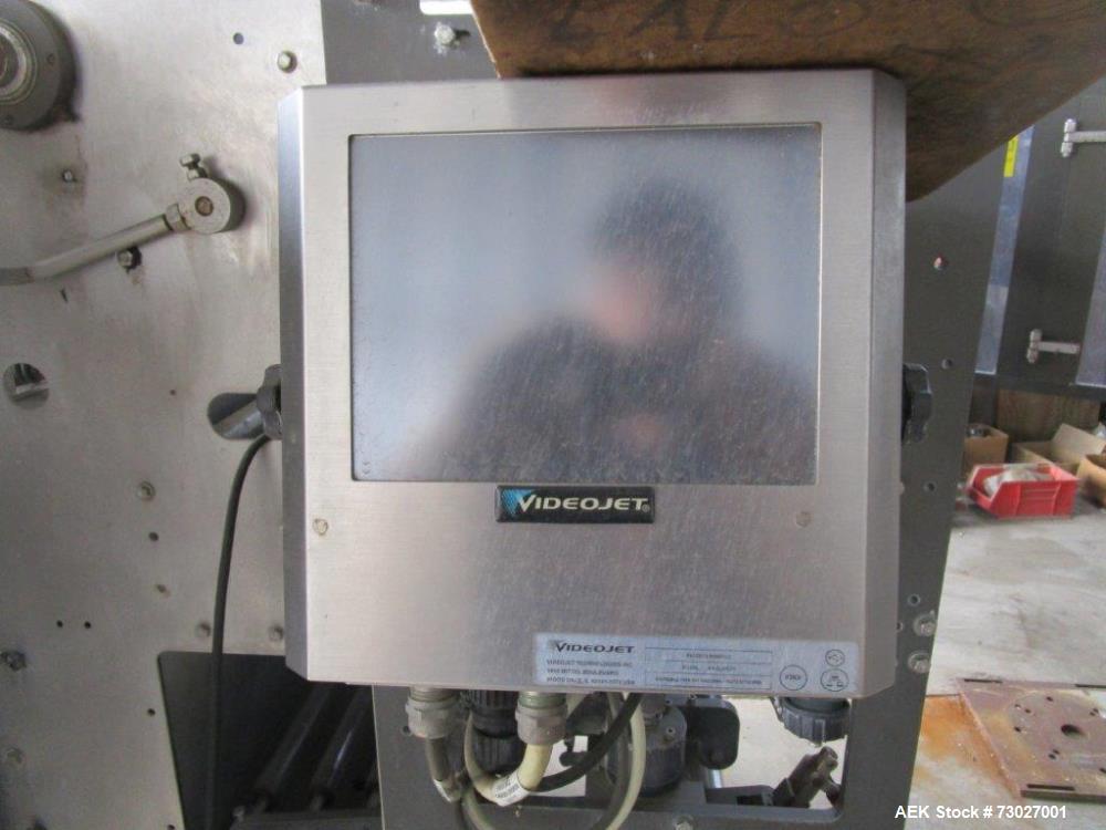 Used Pacmac Model 9500 Vertical Form, Fill, and Seal Machine with Zipper. Has a bag size range of: 3" to 15" (wide) and 4" to 19" (length). Has a maximum web width of 36". Equipped with film registra...